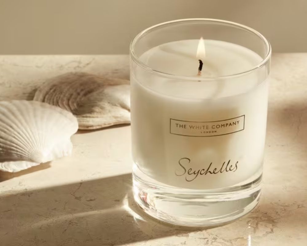 Top 10 Best Scented Living Room Candles for Comfort & Elegance The White Company Seychelles Ceramic Candle - Top best scented living room candles